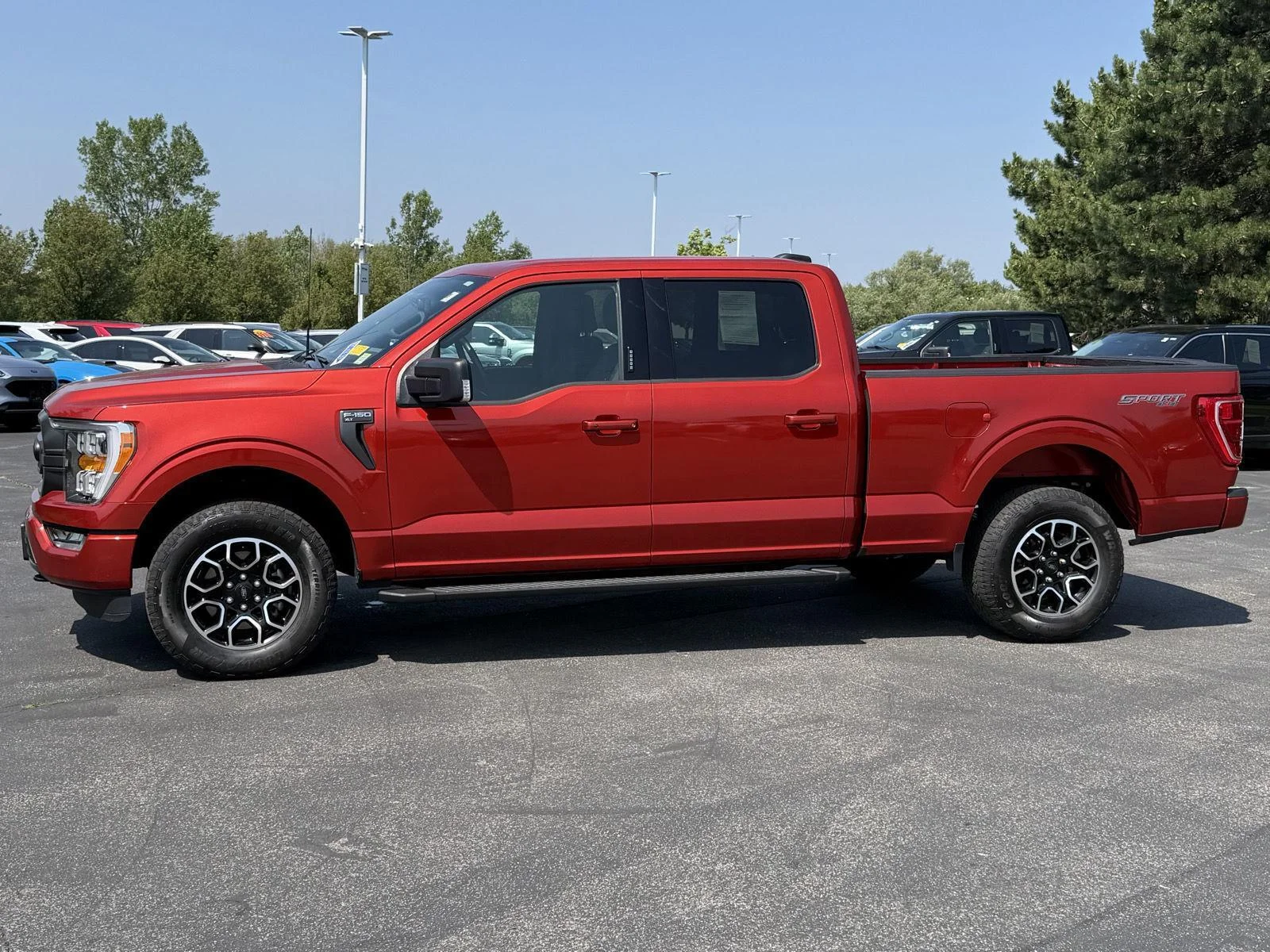 Used 2023 Hot Pepper Red Tinted Clearcoat Ford XLT image 4