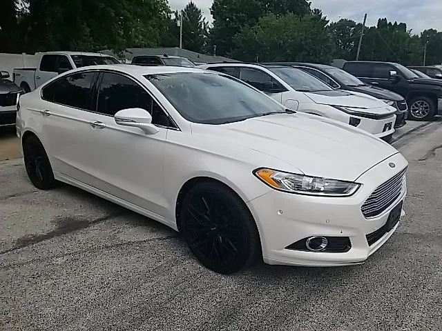 Used 2013 White Ford Titanium image 1