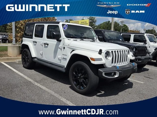 Used 2023 White Jeep Sahara 4xe image 1