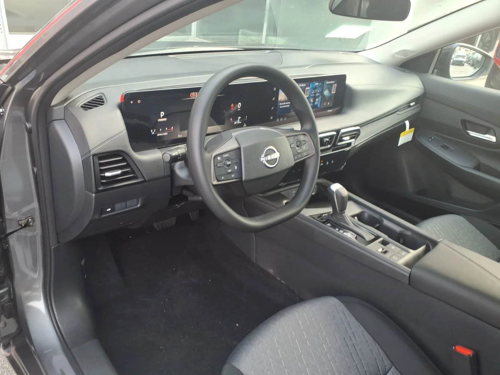 New 2026 Gun Metallic Nissan SV image 5