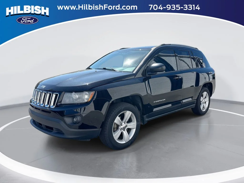 Used 2016 Black Jeep Sport image 1
