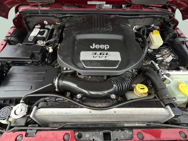 Used 2013 Red Jeep Unlimited Sahara image 27