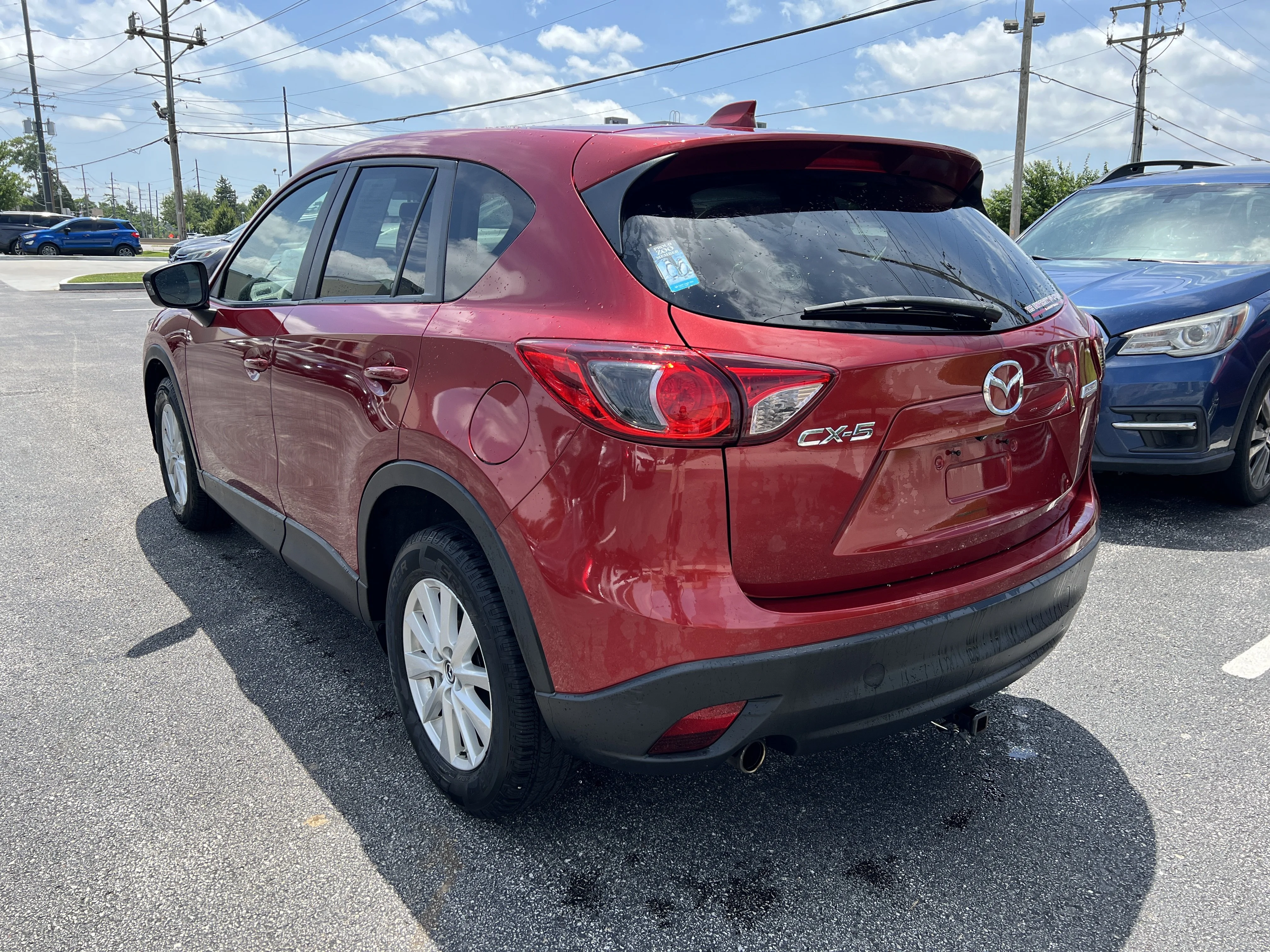 Used 2013 Zeal Red Mica Mazda Touring image 5