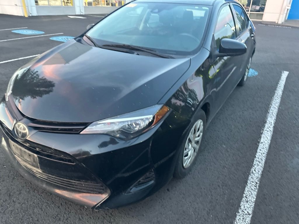 Used 2019 Black Sand Pearl Toyota LE image 2