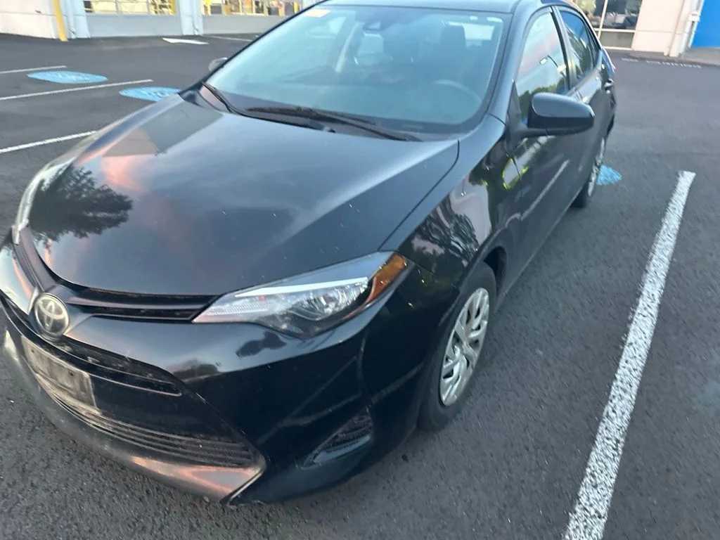 Used 2019 Black Sand Pearl Toyota LE image 2