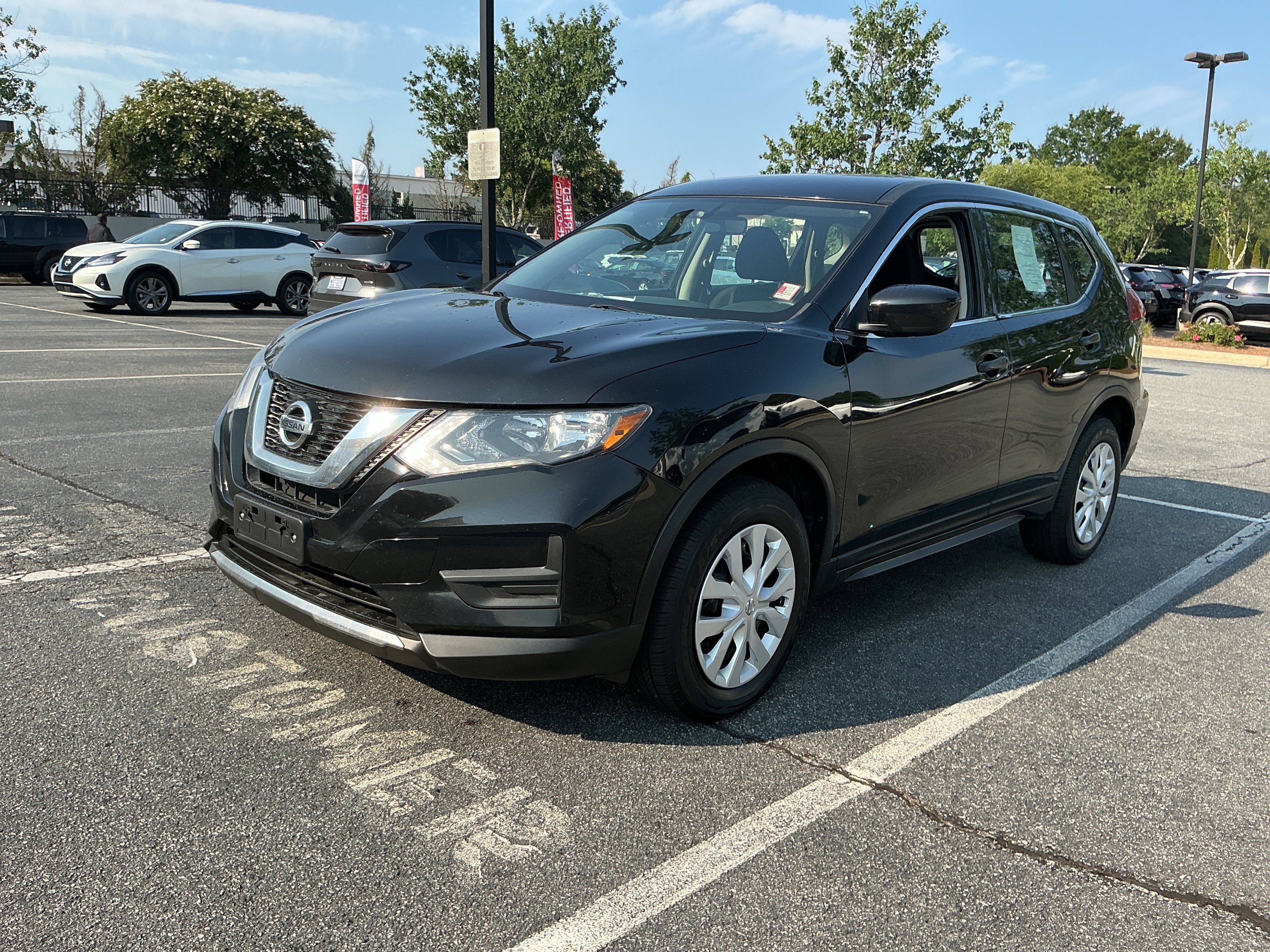 Used 2017 Magnetic Black Nissan S image 1