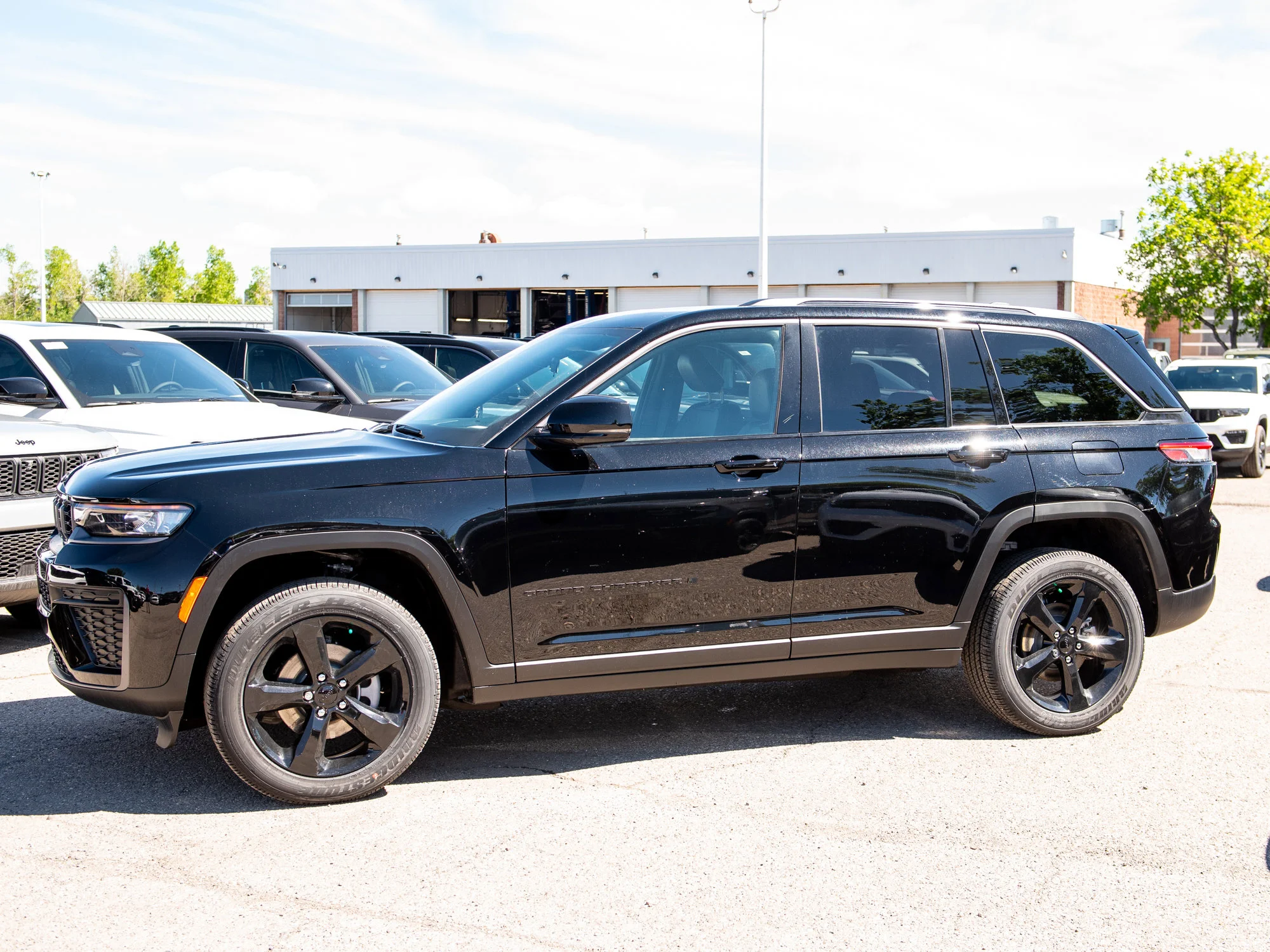New 2026 Black Jeep Altitude* image 2