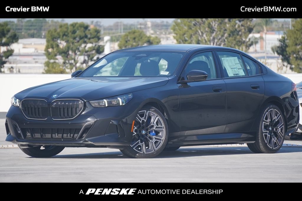 2026 BMW 5 Series 550e xDrive Sedan's photo