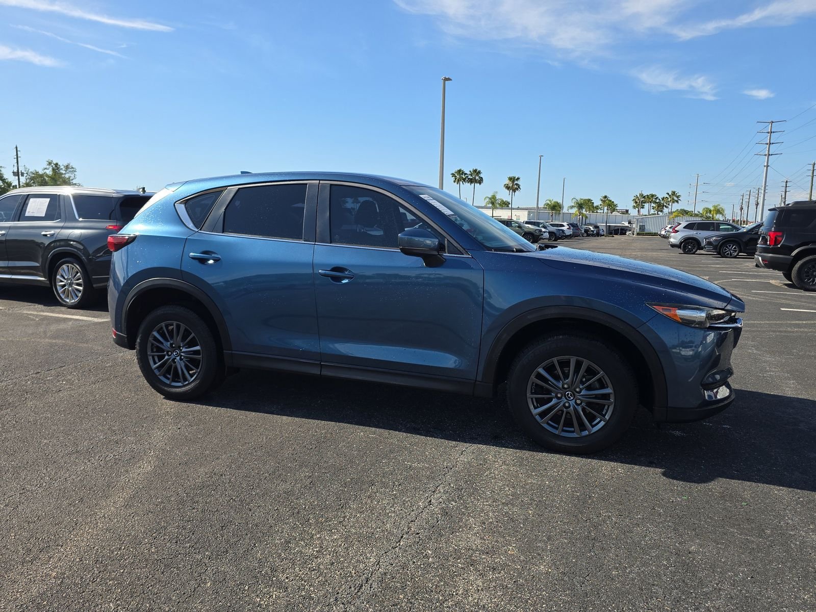 Used 2019 Mazda CX-5 Sport with VIN JM3KFABM3K0621997 for sale in Port Richey, FL