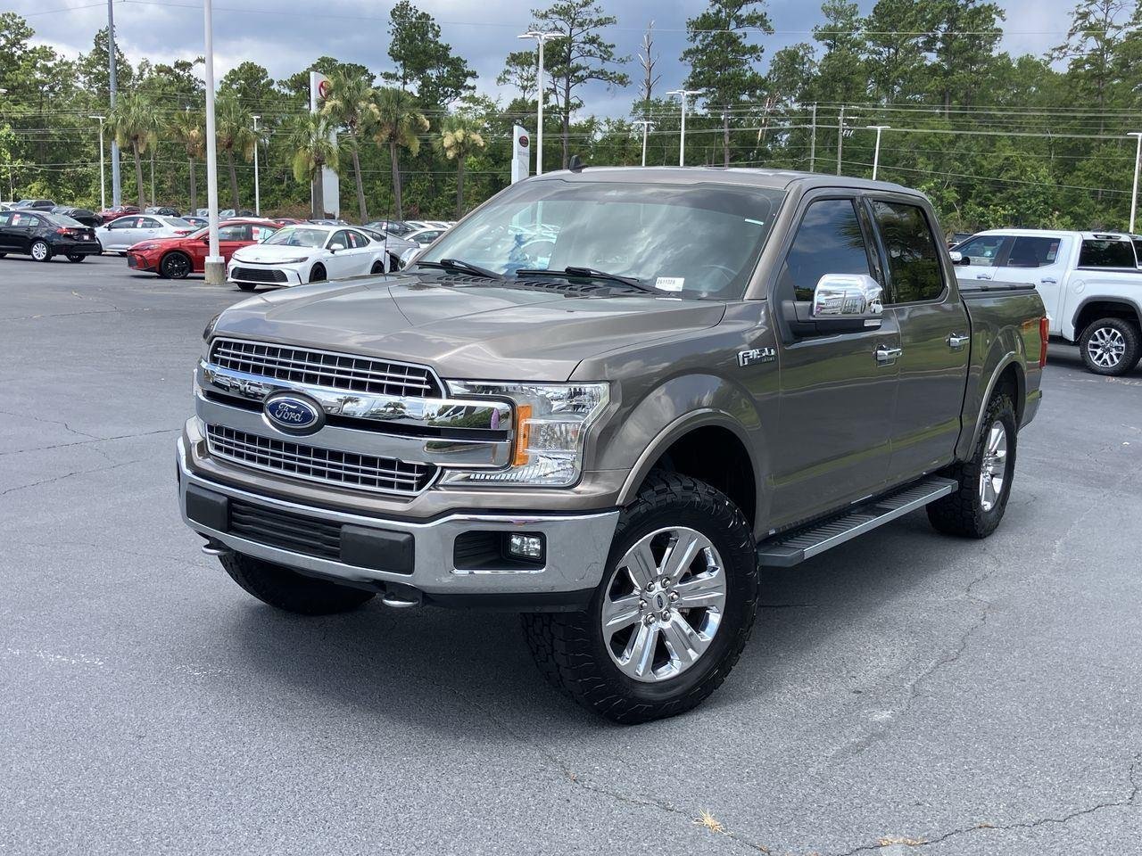 Used 2019 Gray (Stone Gray) Ford Lariat SuperCrew 4WD image 1