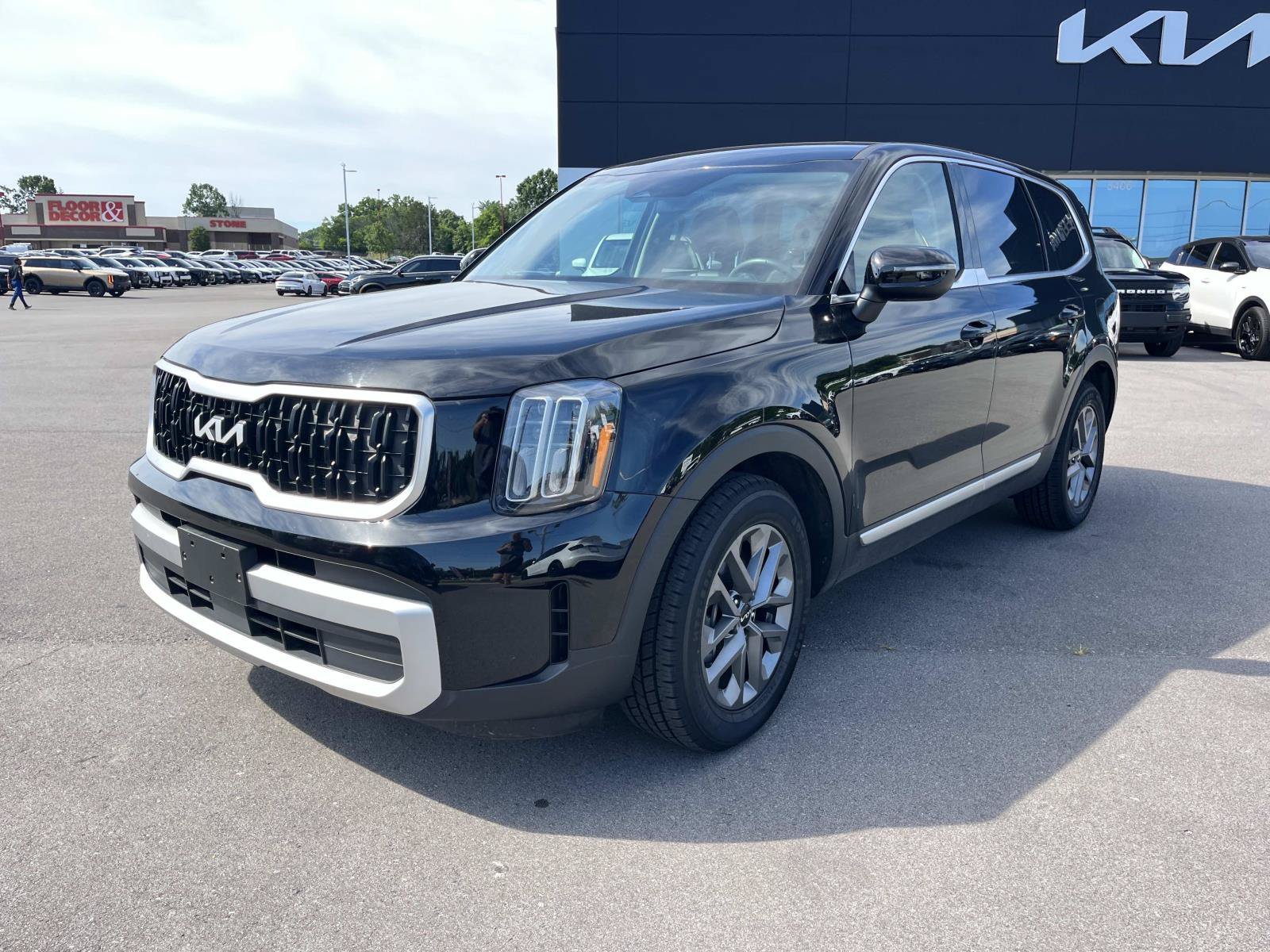 Used 2024 Ebony Black Kia LX image 7