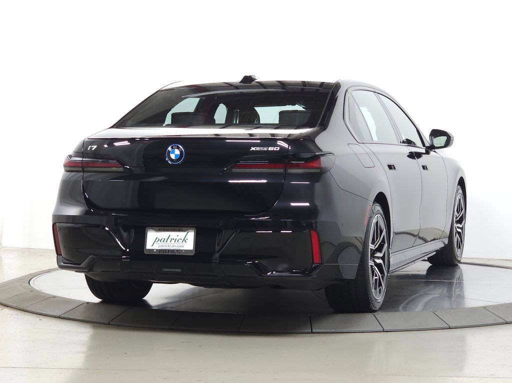 Used 2026 Black Sapphire Metallic BMW xDrive60 image 11