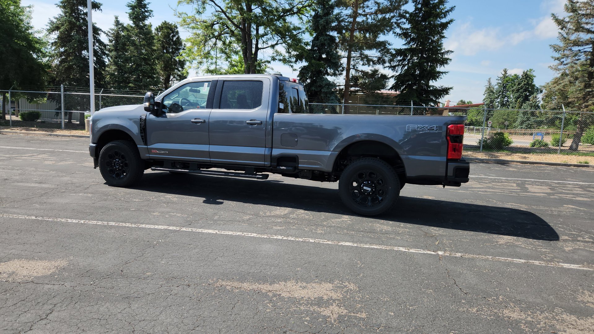 New 2026 Carbonized Gray Metallic Ford LARIAT image 8
