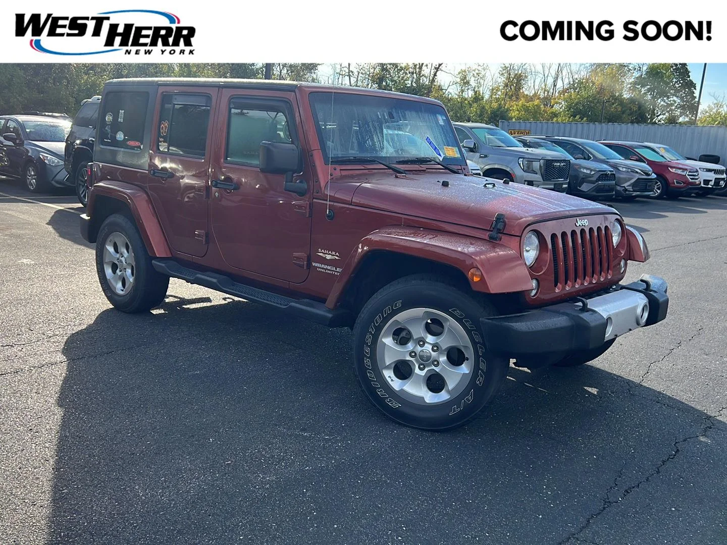 Used 2014 Copperhead Pearlcoat Jeep Sahara image 1