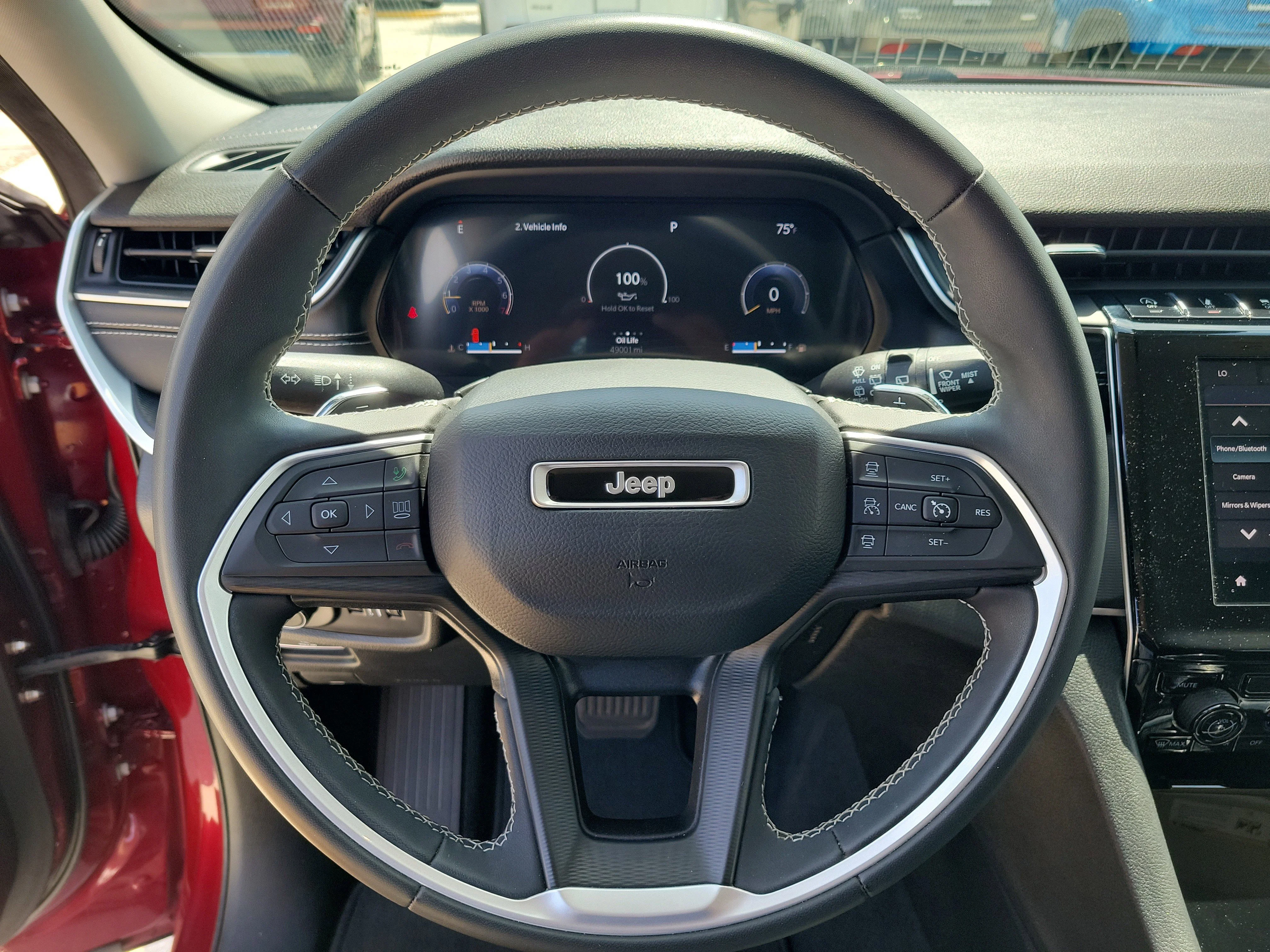 Used 2023 Velvet Red Pearlcoat Jeep Laredo image 24