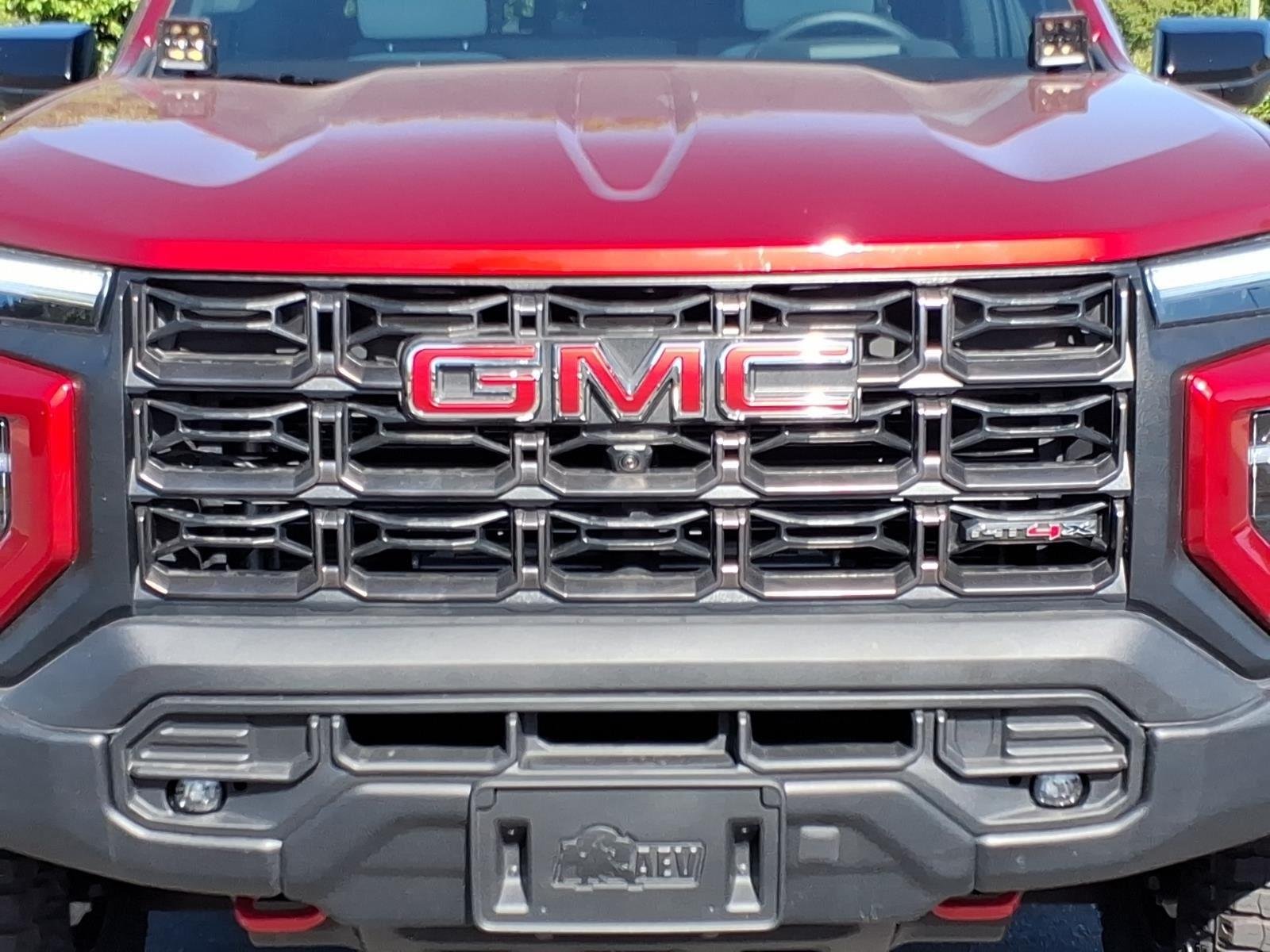 Used 2024 Volcanic Red Tintcoat GMC 4WD AT4X image 15