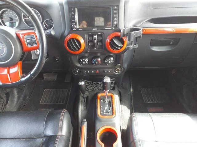 Used 2012 Black Jeep Unlimited Sahara Altitude image 11