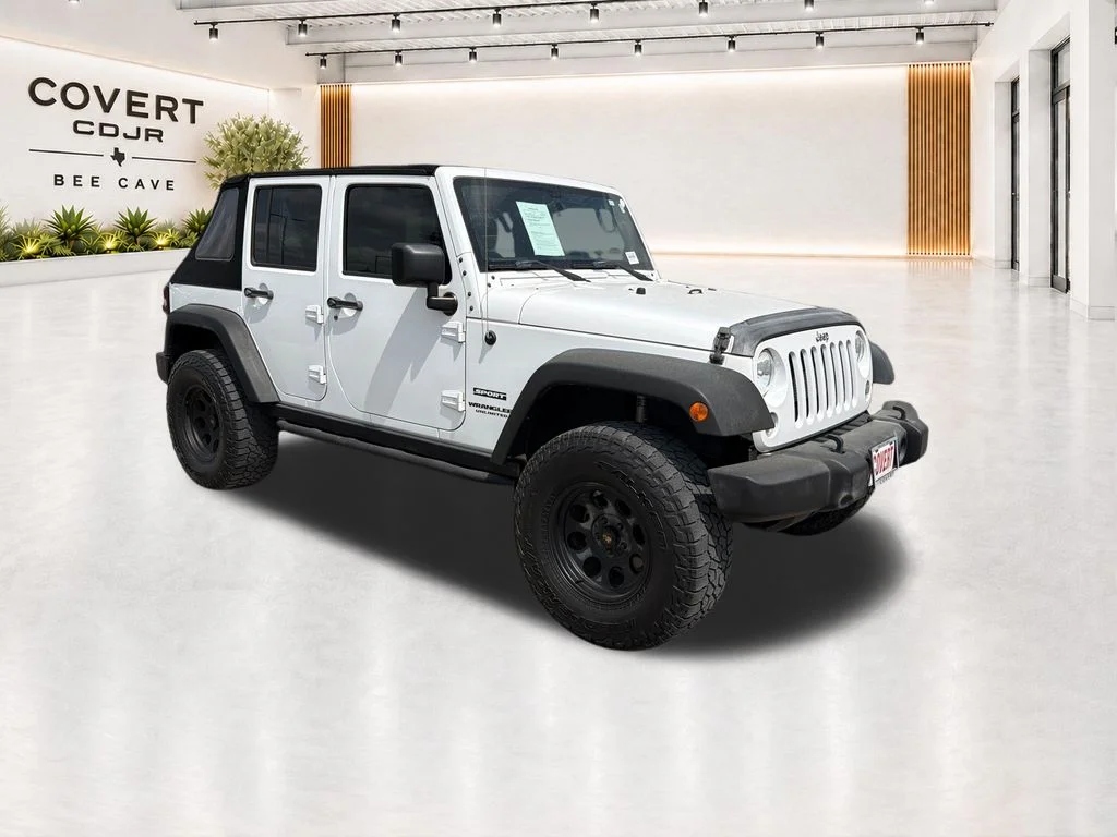 Used 2017 White Jeep Unlimited Sport image 1