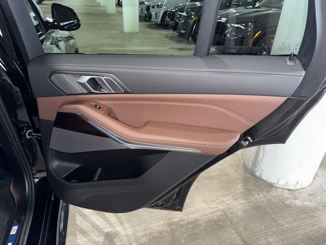 New 2026 Black Sapphire Metallic BMW xDrive50e image 10