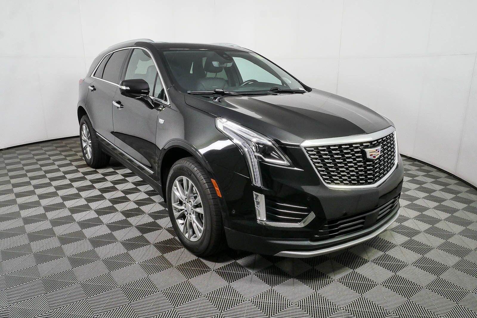 Used 2023 Stellar Black Metallic Cadillac Premium Luxury image 1