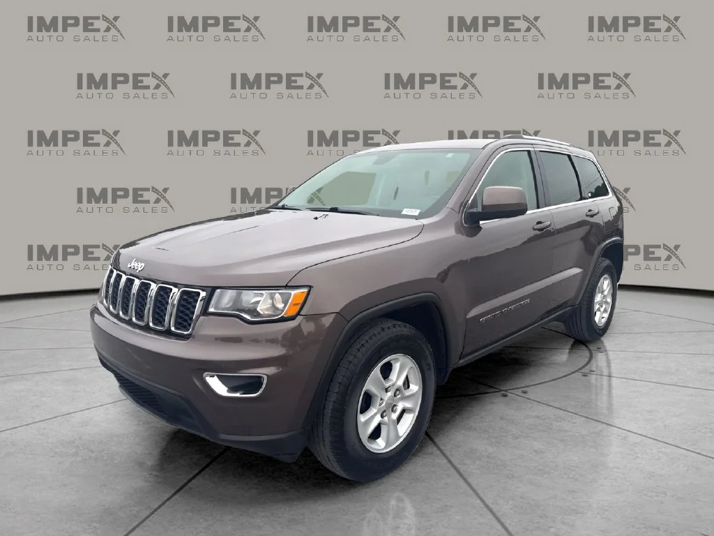Used 2017 Brown Jeep Laredo image 1