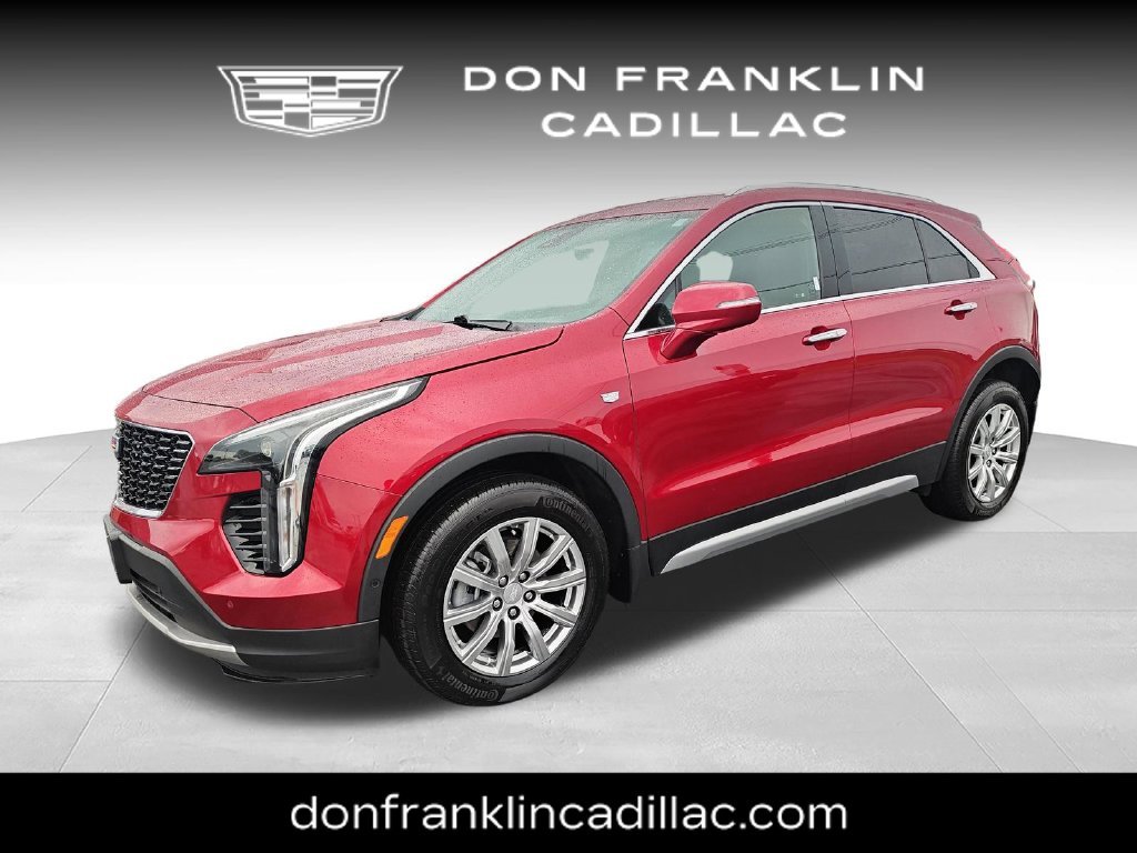 Used 2023 Red Cadillac Premium Luxury image 1
