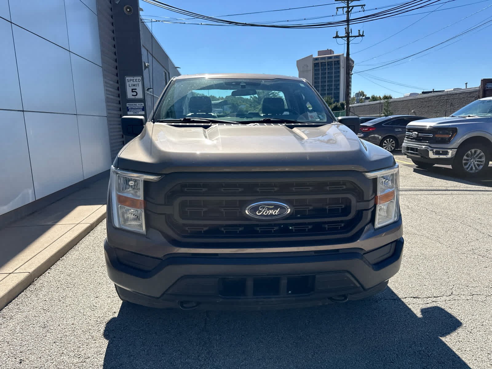 Used 2021 Stone Gray Ford XL 4WD Reg Cab 8 Box image 2