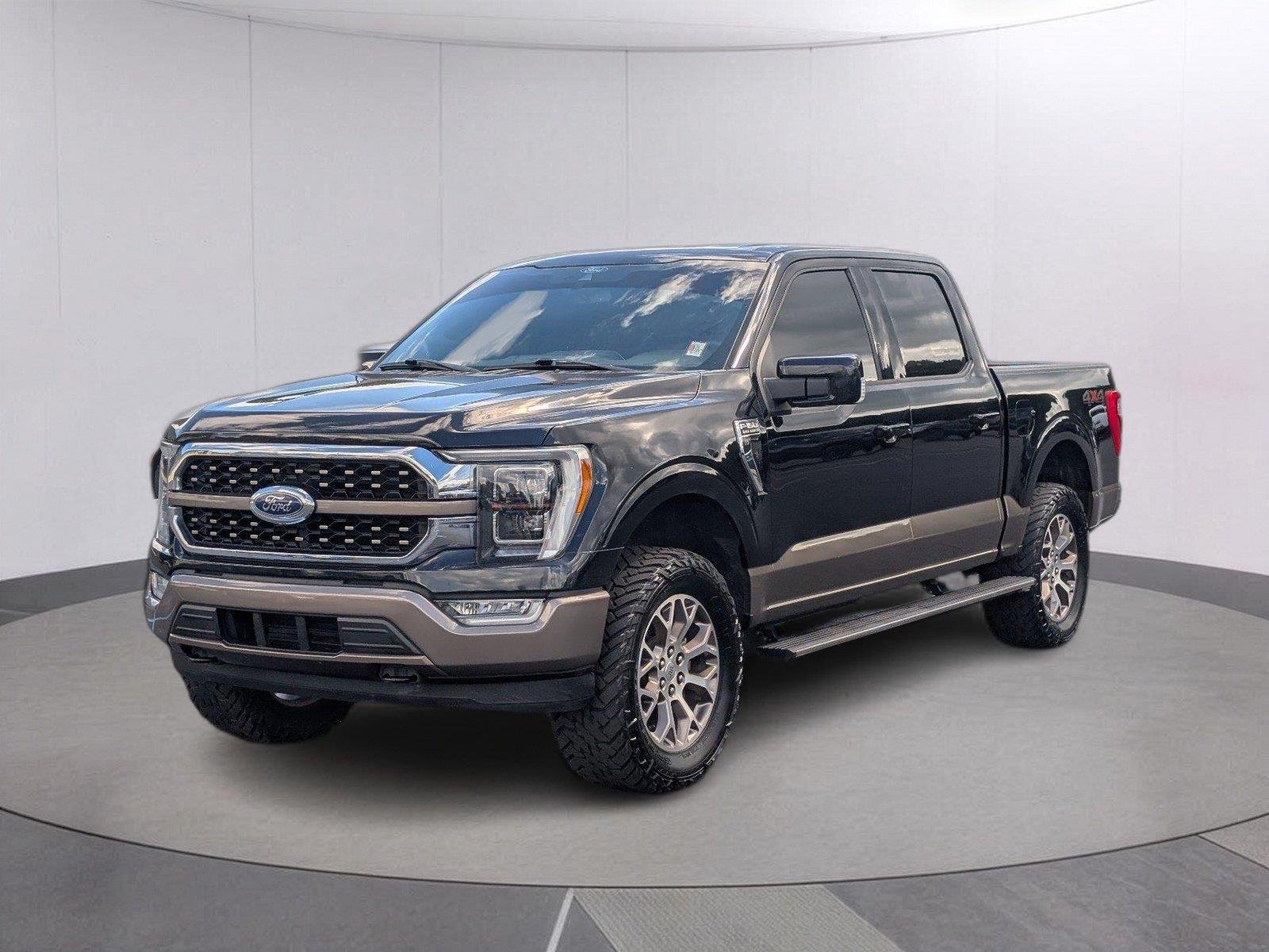 Used 2021 Agate Black/Stone Gray Ford King Ranch image 1