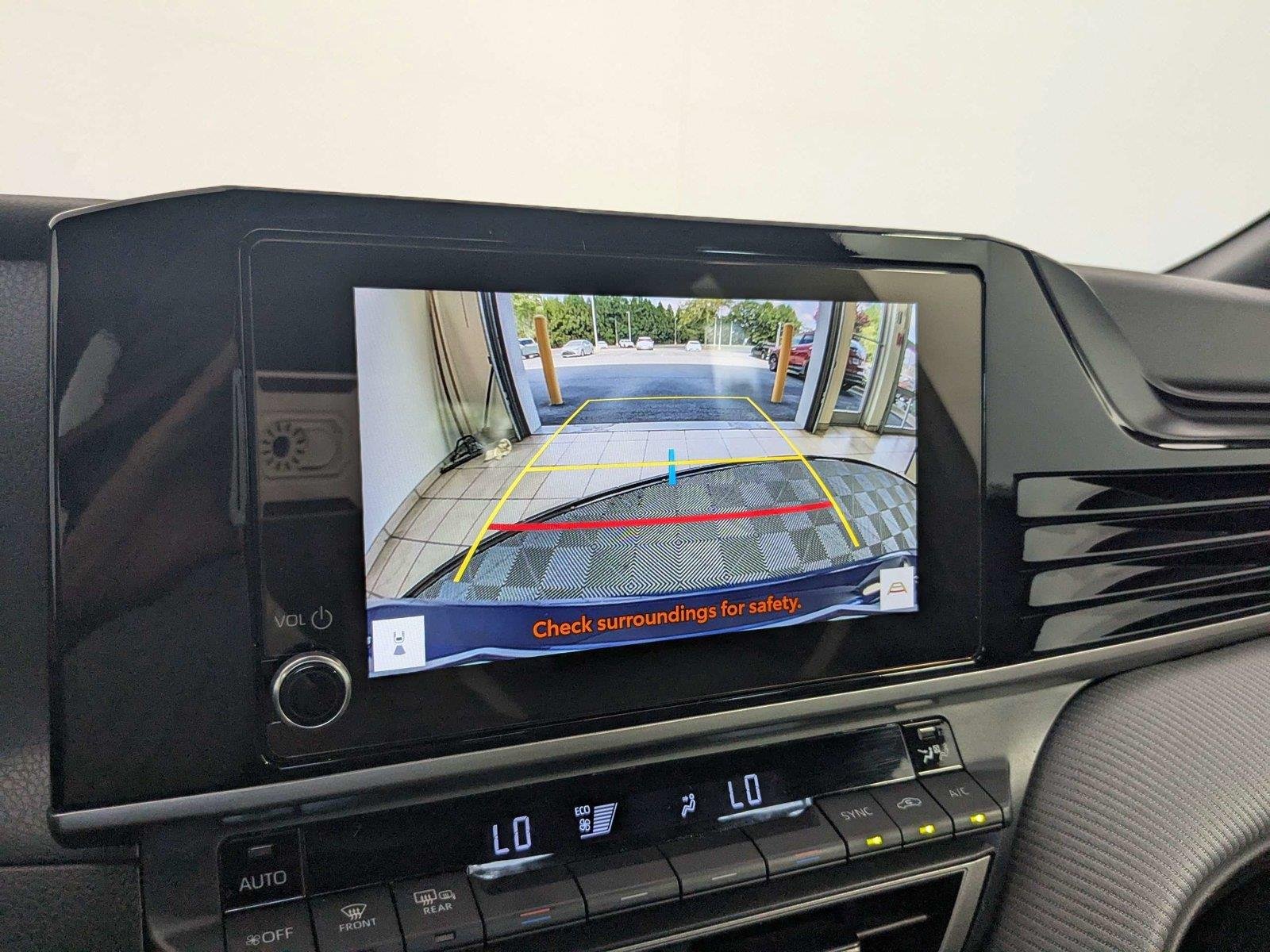 Used 2025 Reservoir Blue Toyota SE image 18