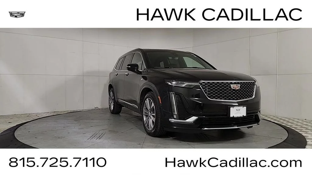Used 2024 Black Cadillac Premium Luxury image 1