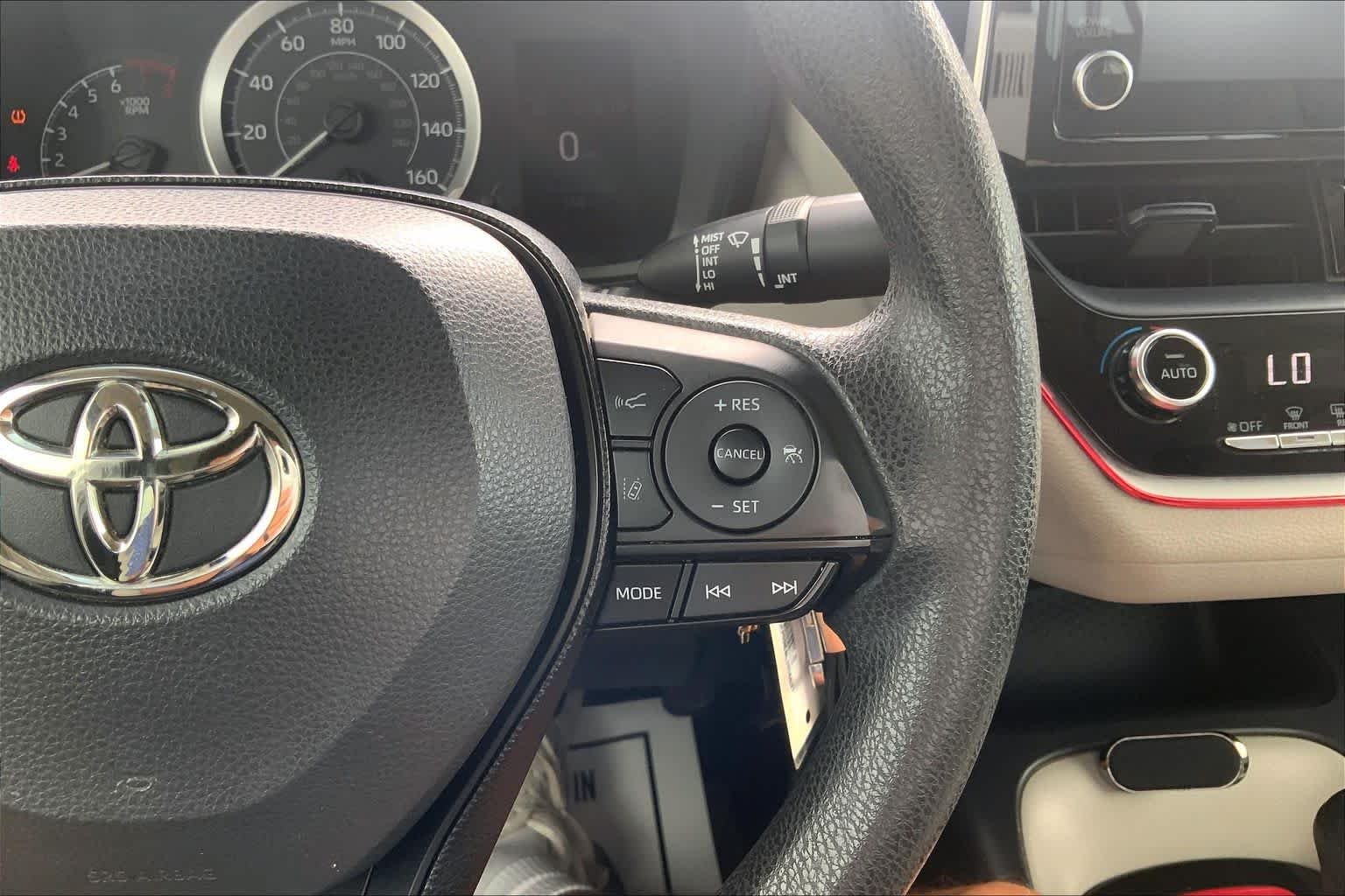 Used 2020 Barcelona Red Metallic Toyota LE image 23