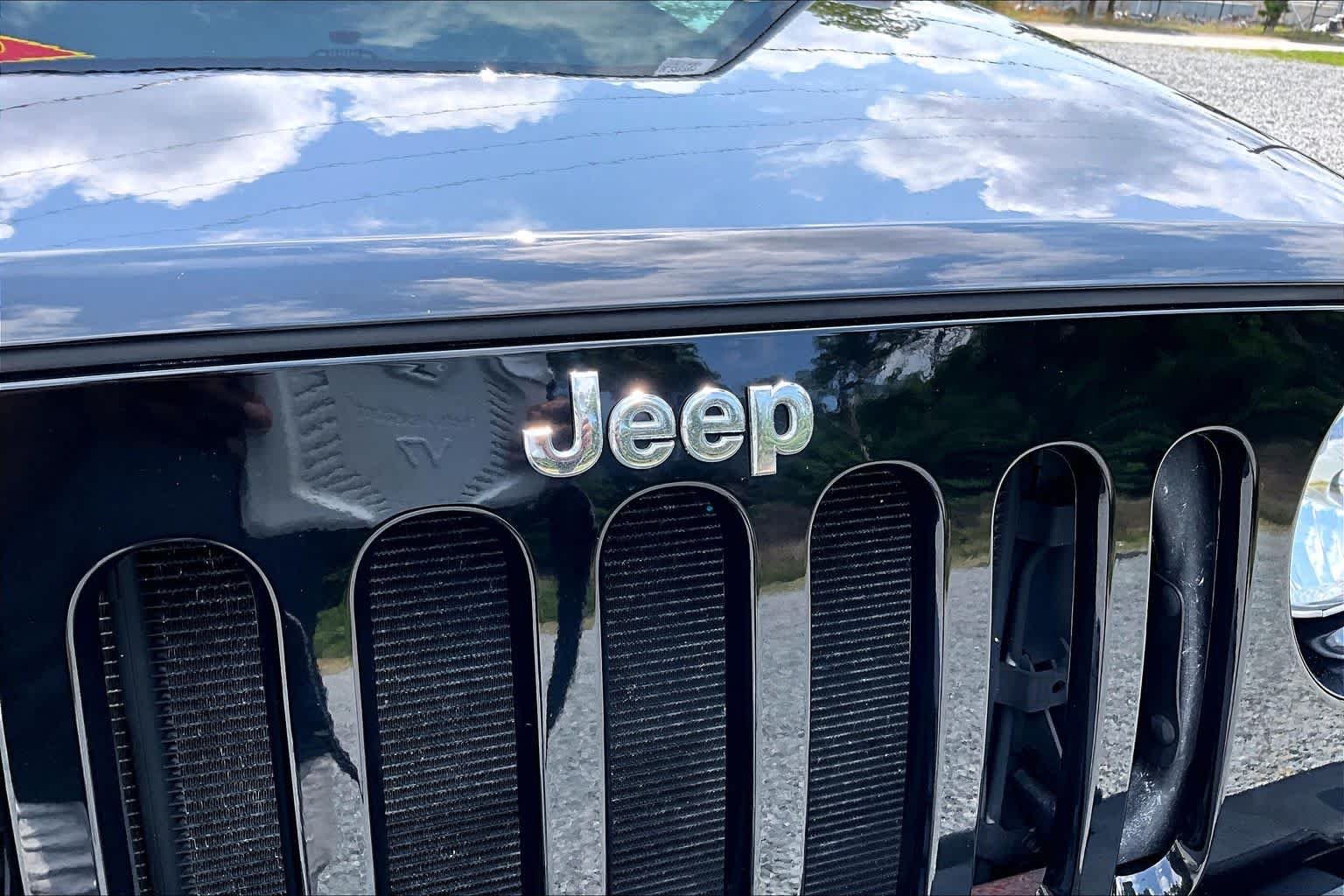 Used 2016 Black Clearcoat Jeep Sport image 31