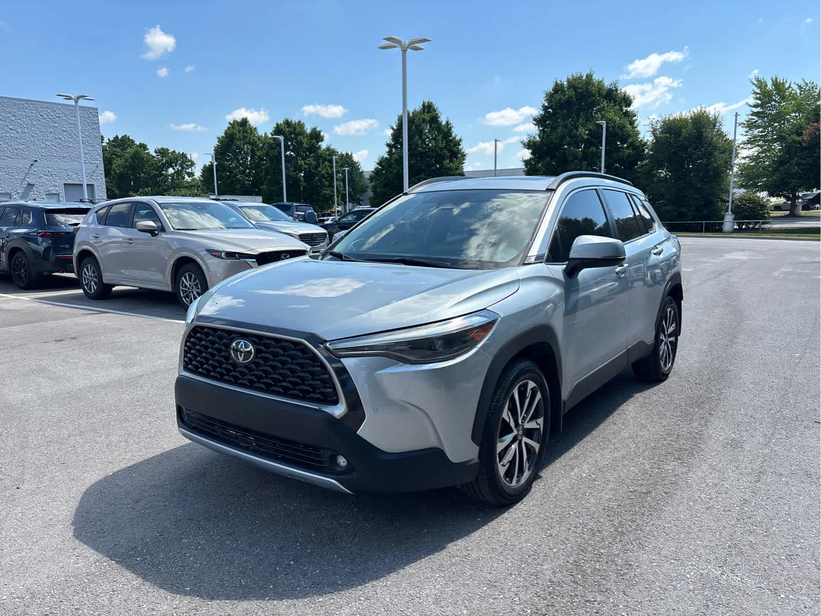 Used 2023 Toyota Corolla Cross XLE with VIN 7MUDAAAG6PV068610 for sale in Kansas City
