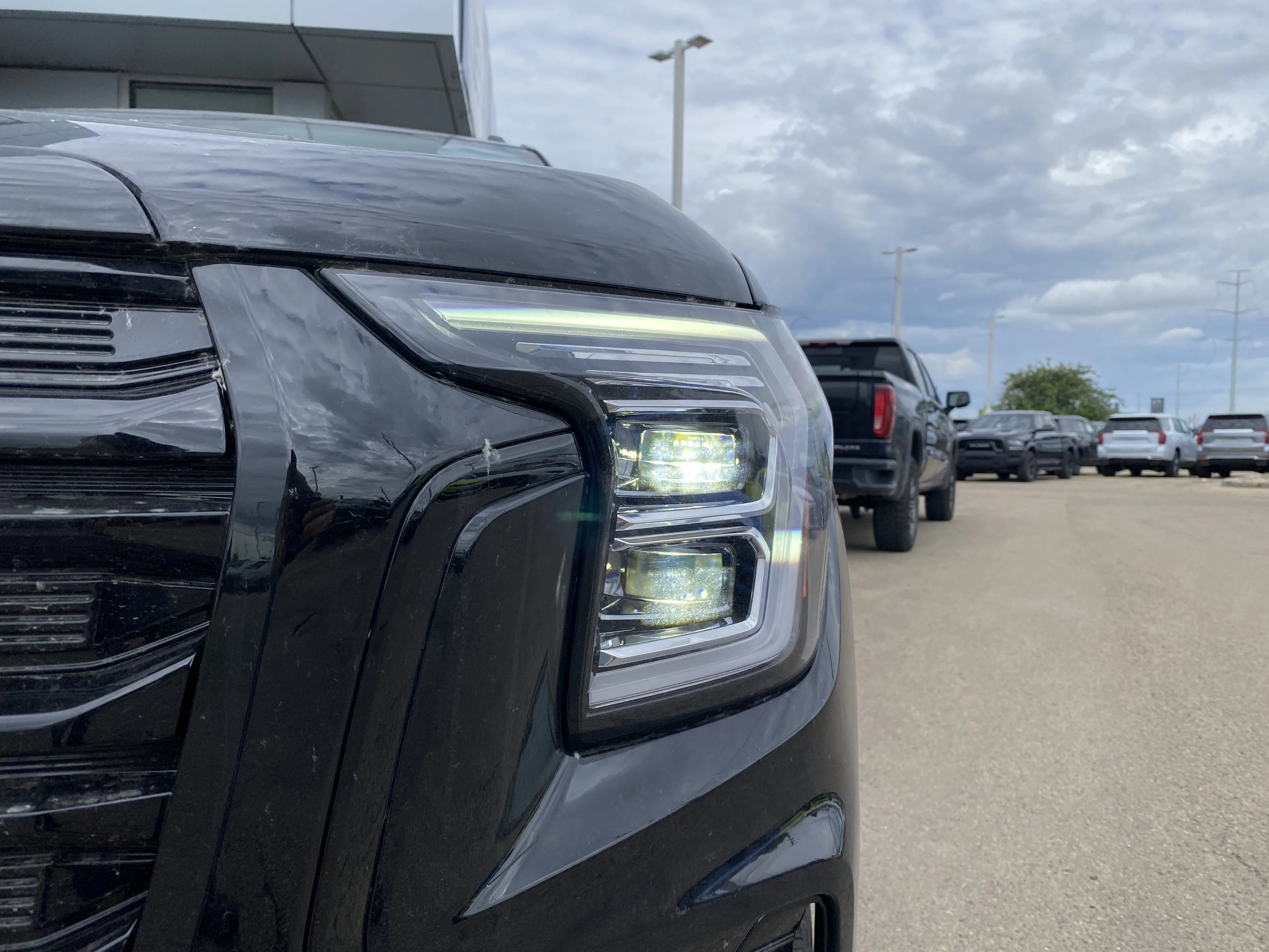 New 2026 EBONY TWILIGHT METALLIC GMC AWD Elevation image 10