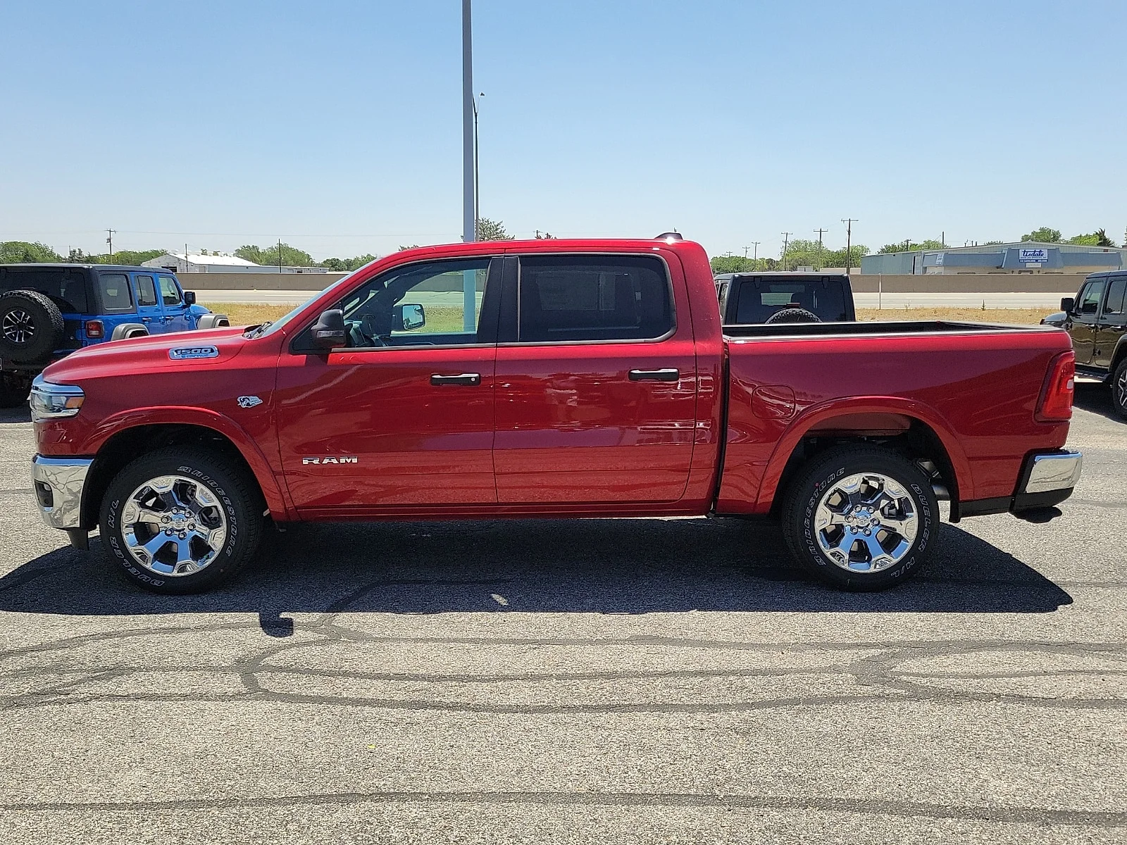 New 2026 Molten Red Pearlcoat Ram LONE STAR CREW CAB 4X4 5