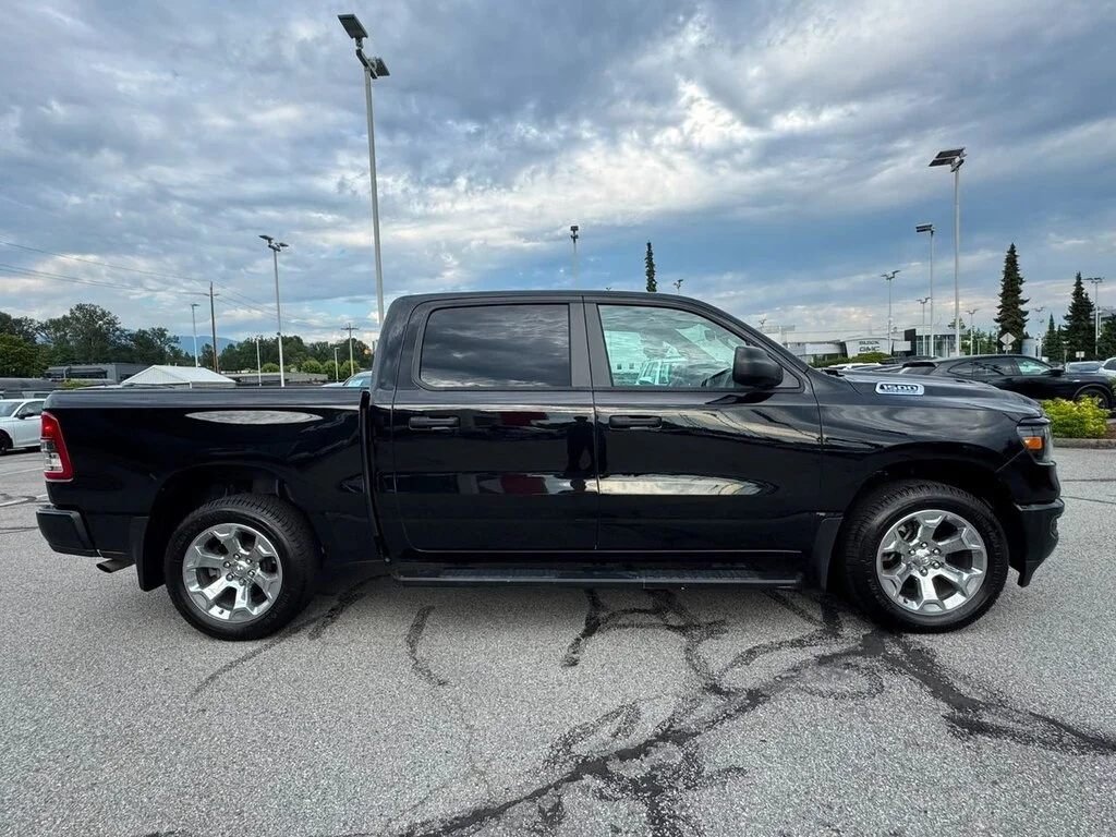 Used 2024 Diamond Black Crystal Pearl Ram Tradesman 4x4 Crew Cab 5