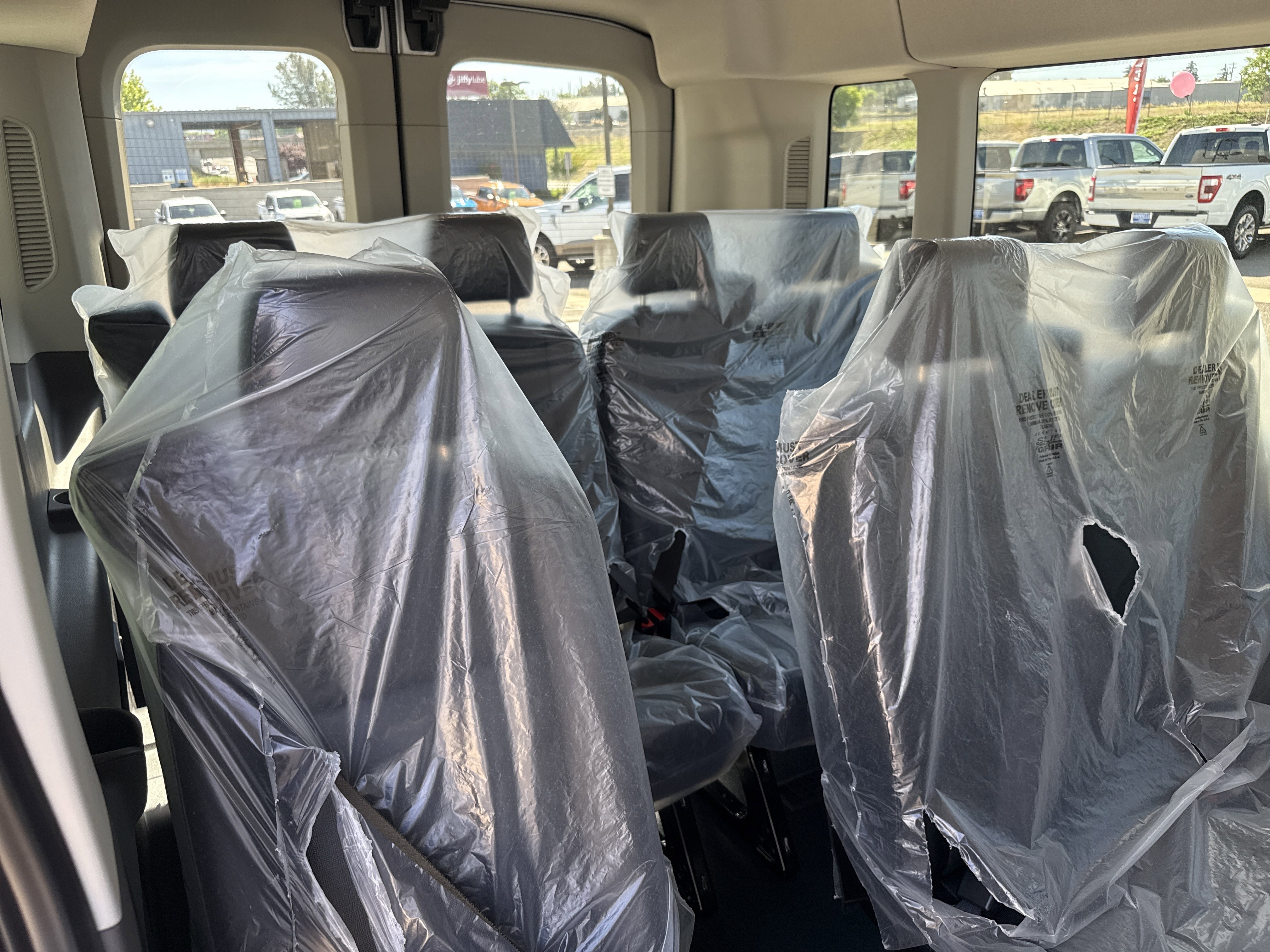 New 2026 Oxford White Ford Passenger Van XL image 14