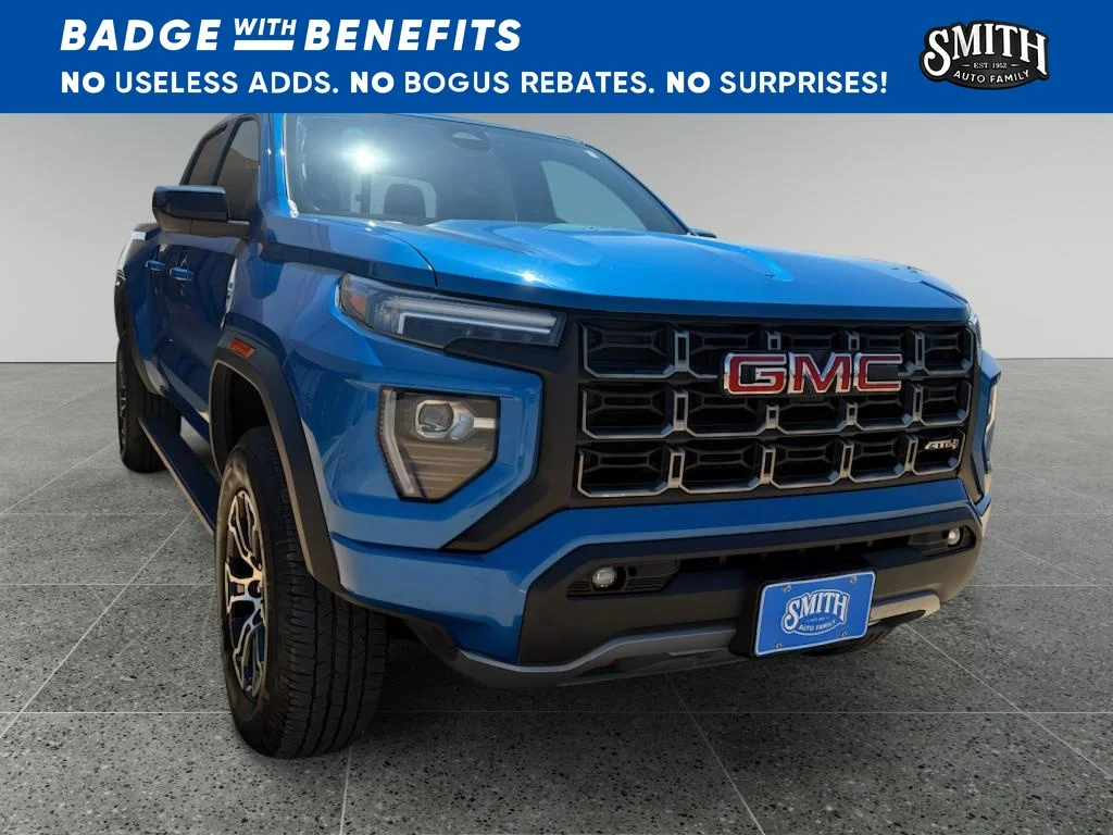 Used 2023 Dynamic Blue Metallic GMC 4WD AT4 image 1