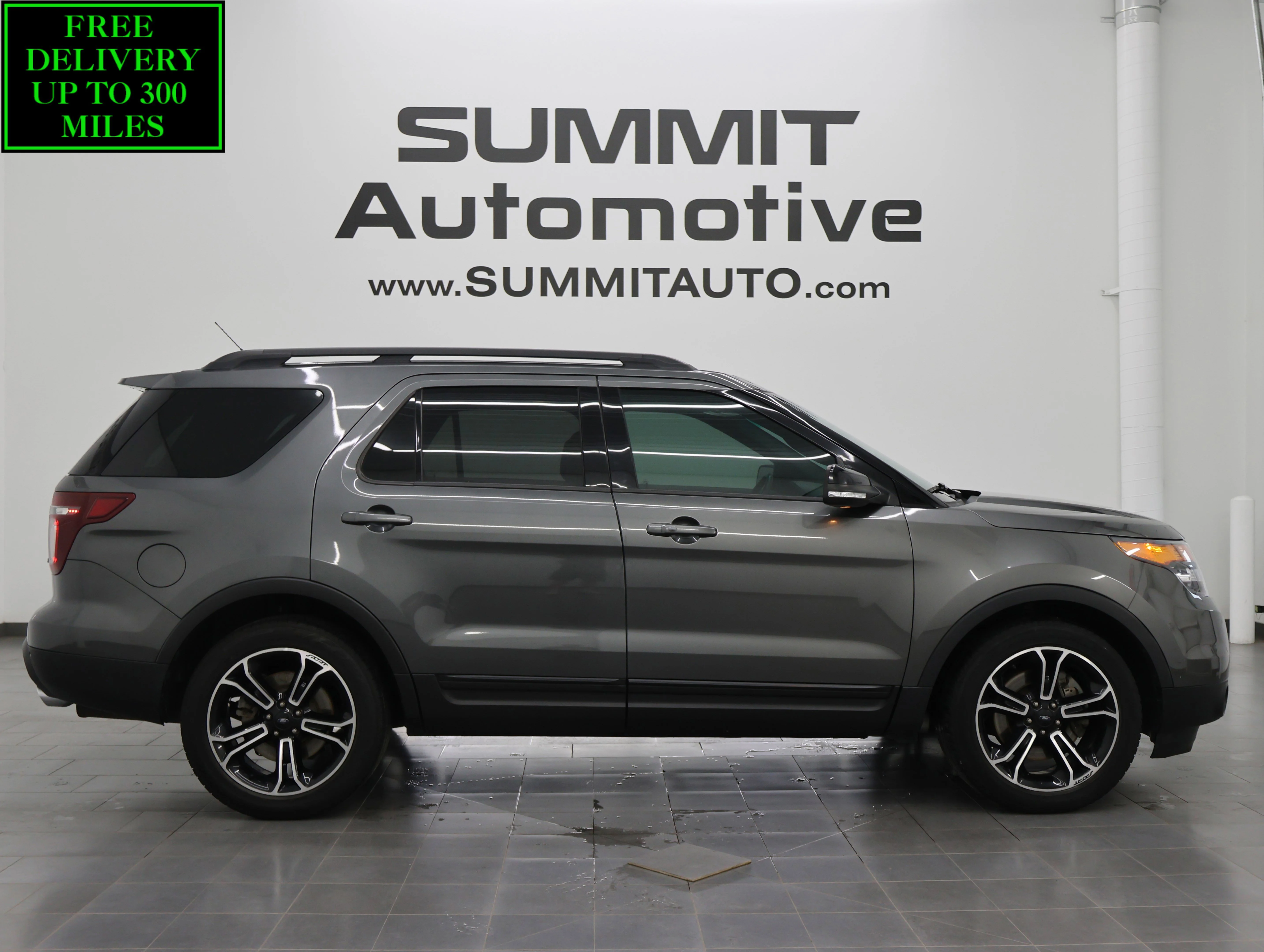 Used 2015 Magnetic Metallic Ford Sport image 1