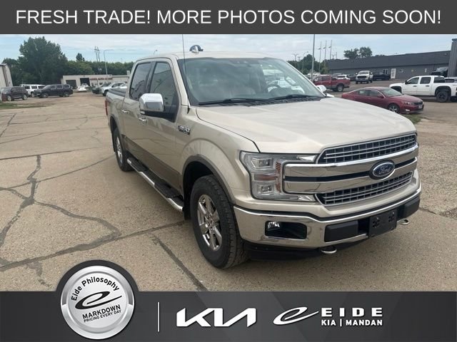Used 2018 Gold Ford Lariat image 1