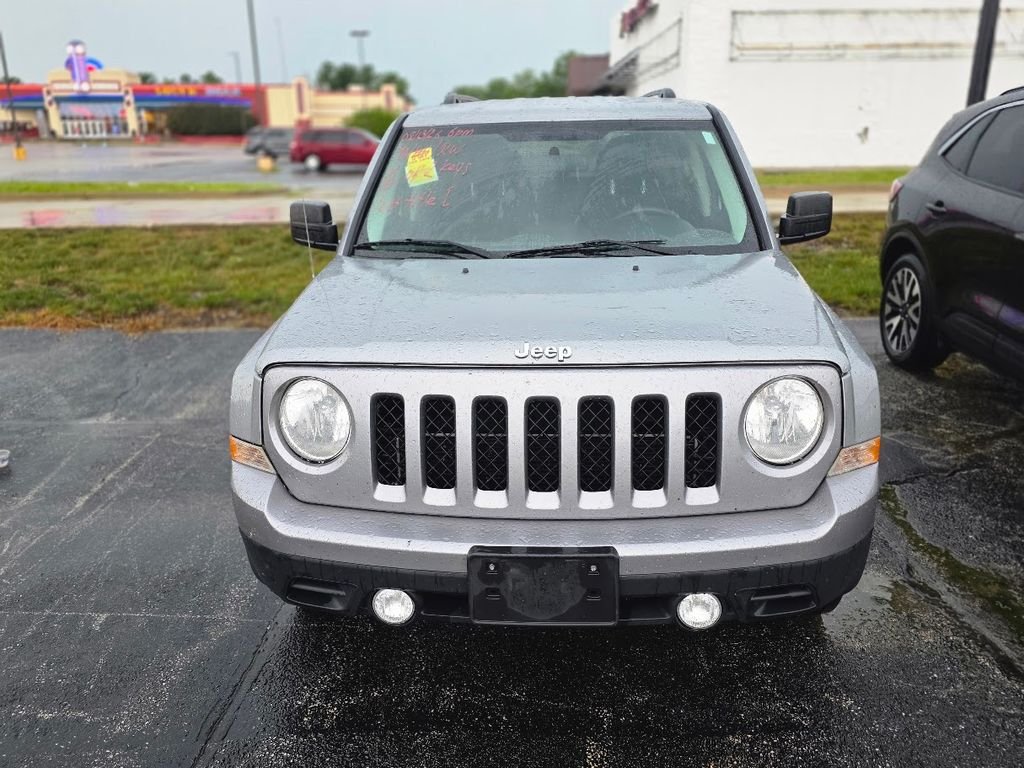 Used 2015 Billet Silver Metallic Clearcoat Jeep Sport image 1