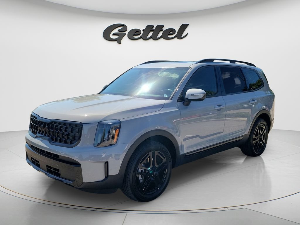 Certified Used 2025 Gray Kia EX X-Line image 1