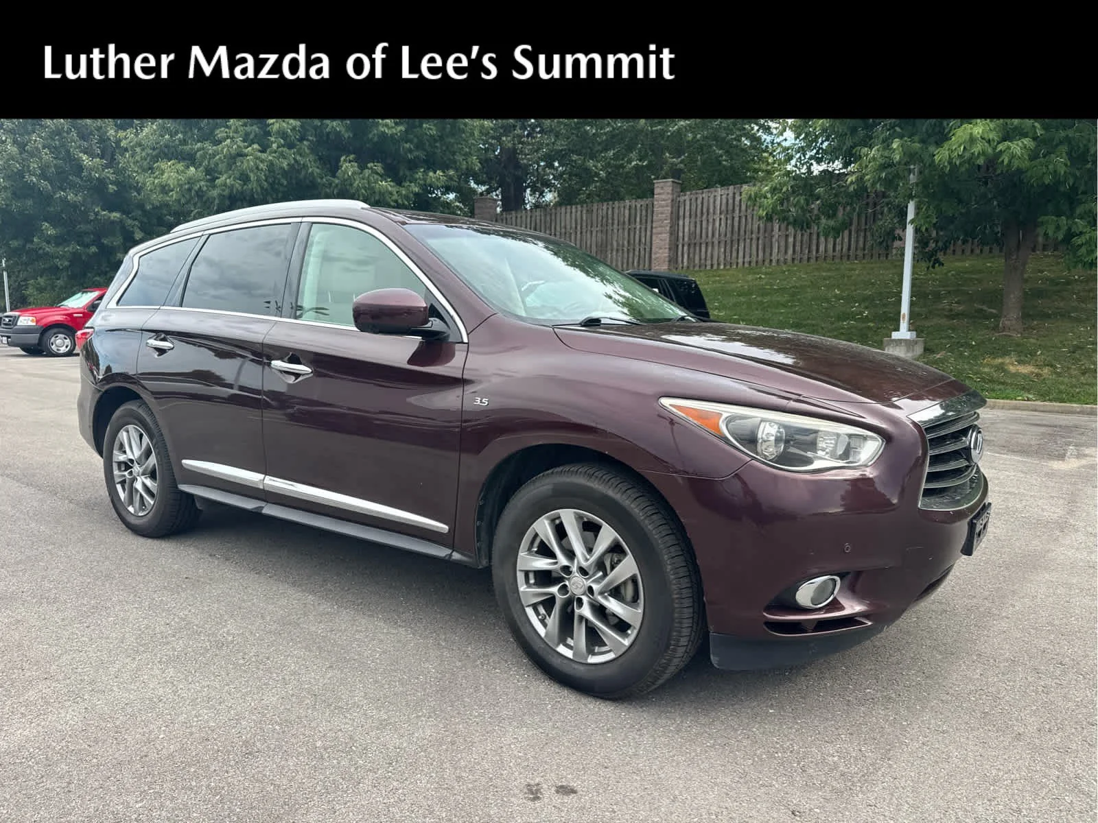 Used 2015 Midnight Garnet INFINITI AWD image 1
