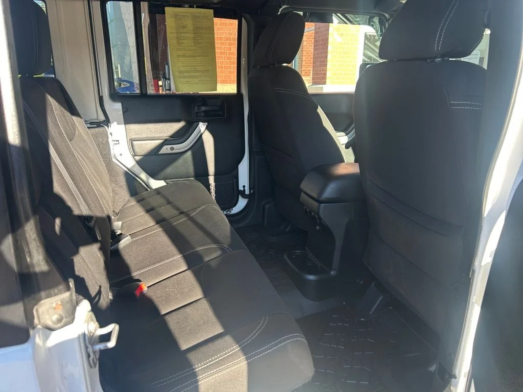 Used 2018 Bright White Jeep Unlimited Sahara 4x4 image 18