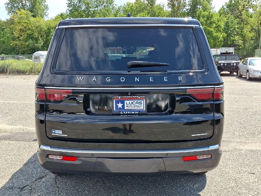 Used 2022 Diamond Black Crystal Pearlcoat Jeep Series II image 10