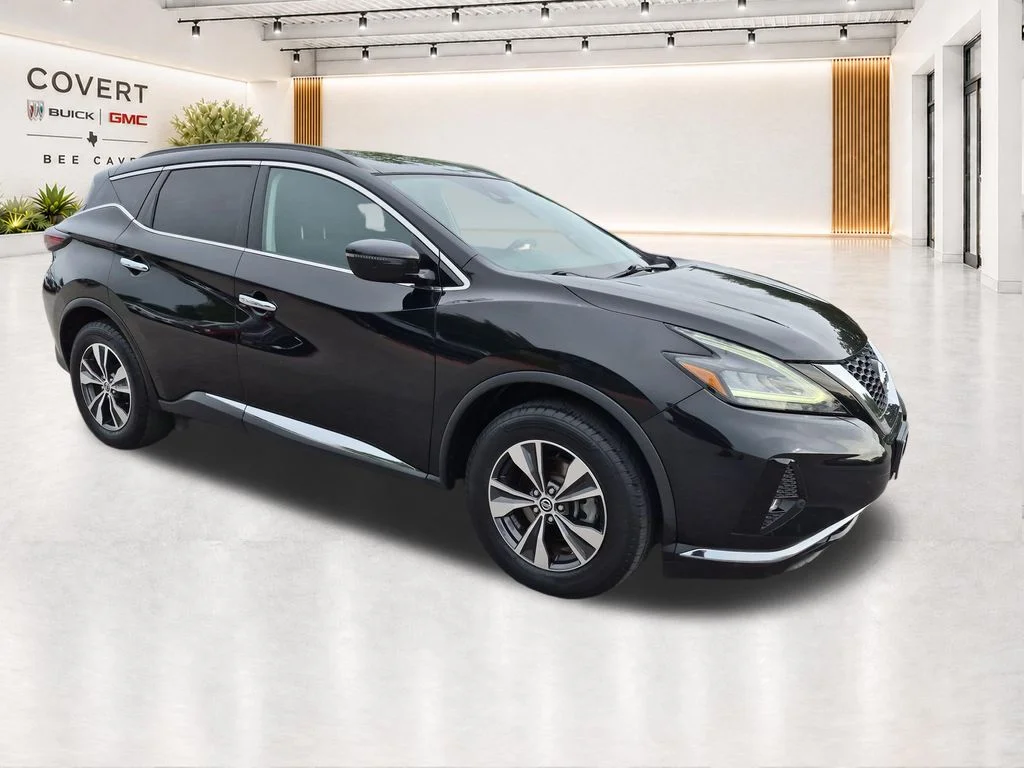Used 2021 Black Nissan SV image 1