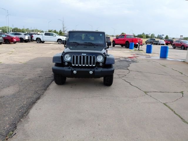 Used 2016 Black Clearcoat Jeep Sahara image 9