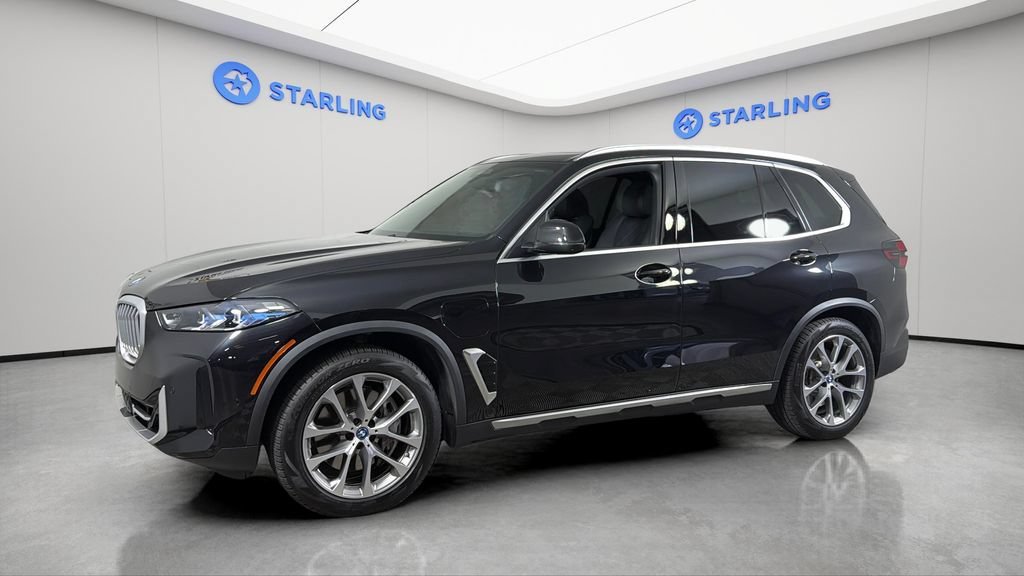 Used 2025 Black BMW xDrive50e image 2