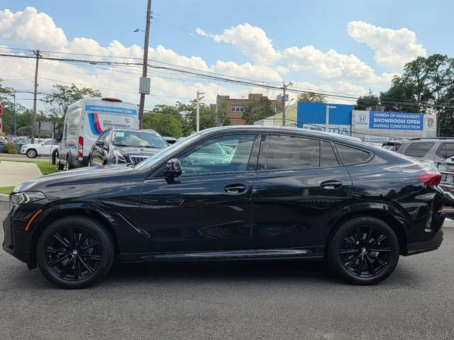 Certified Used 2024 Black Sapphire Metallic BMW xDrive40i image 4