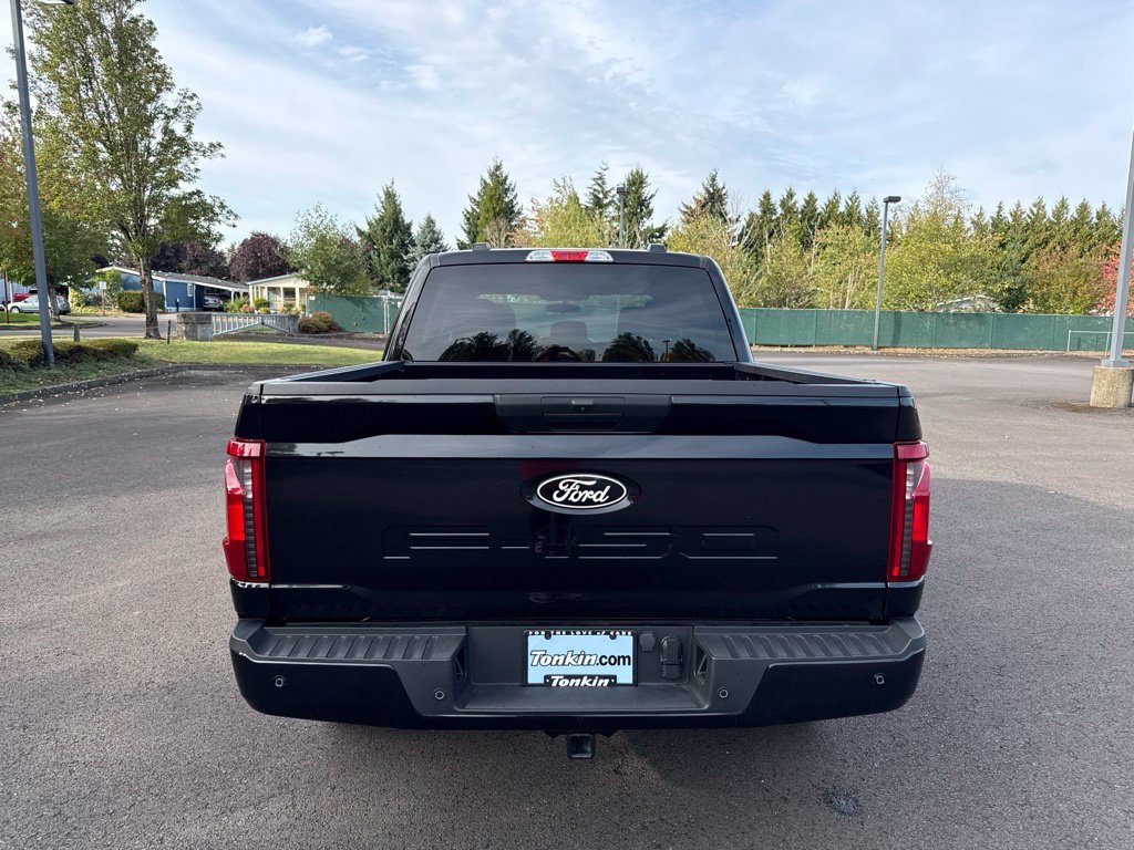 Used 2025 Agate Black Metallic Ford STX image 6